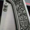 il_fullxfull.8012475322_6ggg.jpg Chaves Knives - Relief Engraved RCK9 - Titanium Scales -Knight’s Crest - M390 Steel - COMPLETE KNIFE!! With Extra Clip - New in Box