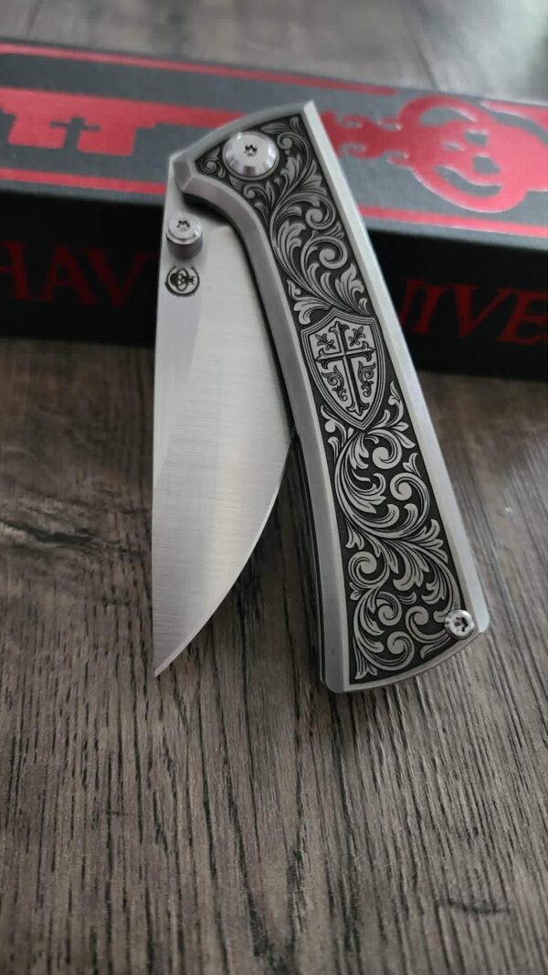 il_fullxfull.8012480710_huyz.jpg Chaves Knives - Relief Engraved RCK9 - Titanium Scales -Knight’s Crest - M390 Steel - COMPLETE KNIFE!! With Extra Clip - New in Box