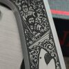 il_fullxfull.8060397595_h0mv.jpg Chaves Knives - Relief Engraved RCK9 - Titanium Scales -Jaws Theme! - M390 Steel - COMPLETE KNIFE!! With Extra Clip - New in Box