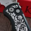 il_fullxfull.8108786719_r1ls.jpg Chaves Knives Pro-Tech Redencion 229 – SW Black – Custom Pin-Up Scroll Engraved Knife – Luxury EDC - Chaves Knives