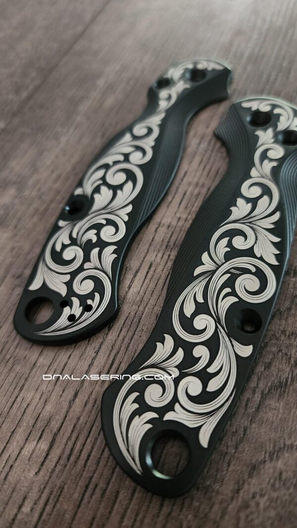 il_fullxfull.8386029538_2zsc.jpg Titanium Black Laser Engraved Custom Ornate Scroll - Spyderco Paramilitary 2 Lotus Scales - PM2 Scales - Flytanium Gear