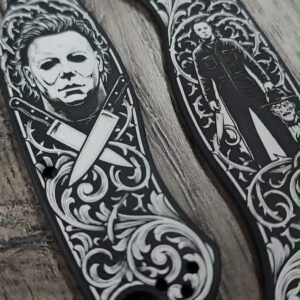 il_fullxfull.8126657497_7dl6.jpg Custom Spyderco PM2 Black Aluminum AWT Legacy | Michael Myers & Freddy Krueger Horror Engraving | Custom Laser Engraved - Made in USA!