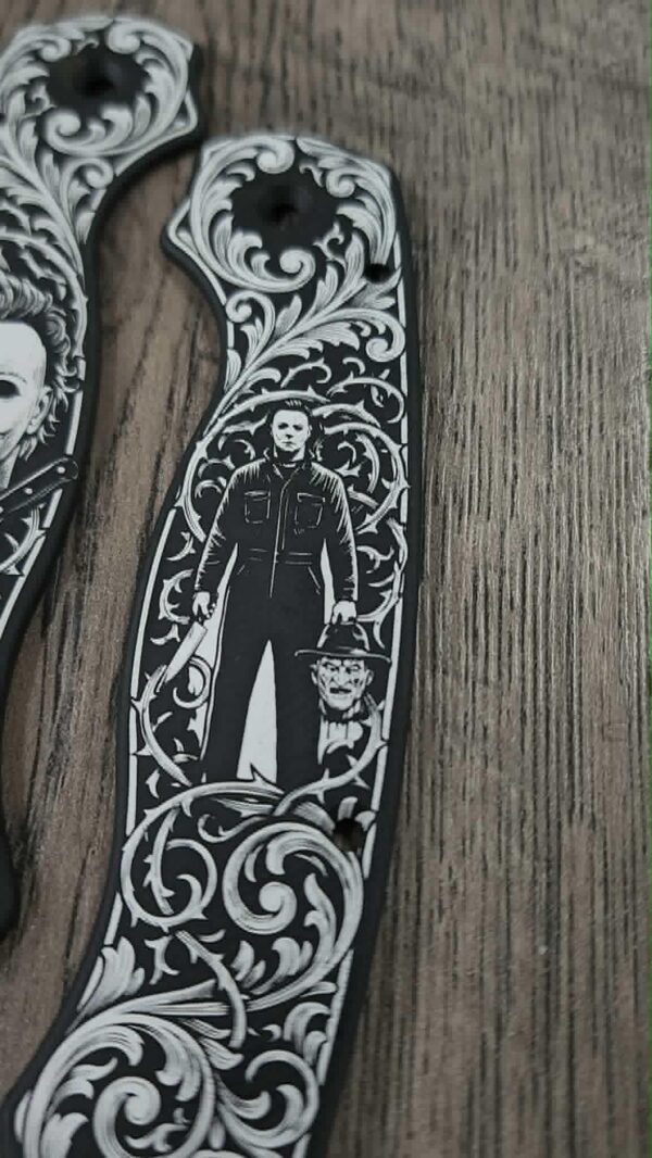 il_fullxfull.8126658569_41b3.jpg Custom Spyderco PM2 Black Aluminum AWT Legacy | Michael Myers & Freddy Krueger Horror Engraving | Custom Laser Engraved - Made in USA!