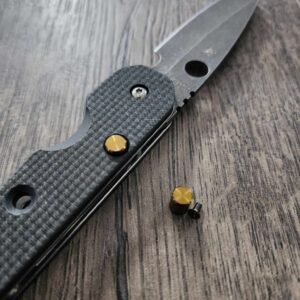 il_fullxfull.4955595783_f458.jpg Spyderco Smock - Replacement Button (Lock Release) - Titanium - Bronze Anodize - EDC Gear ( knife not included )