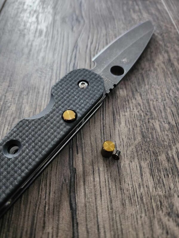 il_fullxfull.4955595783_f458.jpg Spyderco Smock - Replacement Button (Lock Release) - Titanium - Bronze Anodize - EDC Gear ( knife not included )