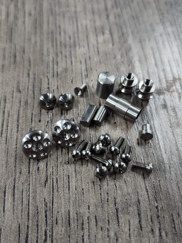il_fullxfull.7770036340_8uk9.jpg LARGE PIVOT!! Smock Replacement Hardware Screw Set for Spyderco Smock Knife - Titanium - Knife NOT included